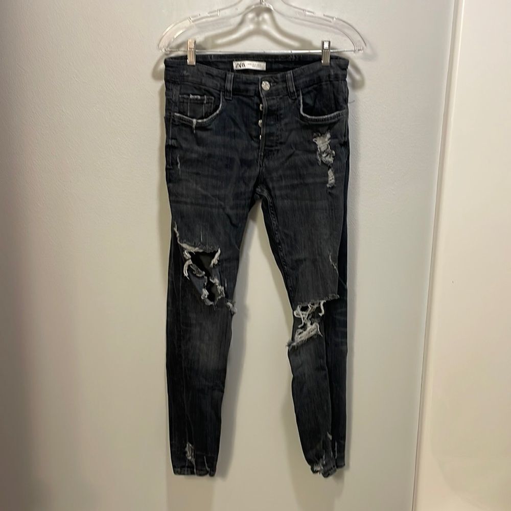 ZARA woman’s faded black ripped jeans